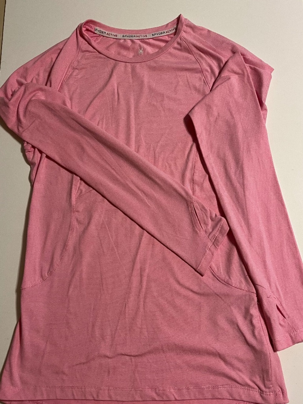 pink Spyder Active athletic top features a ribbed texture size Medium